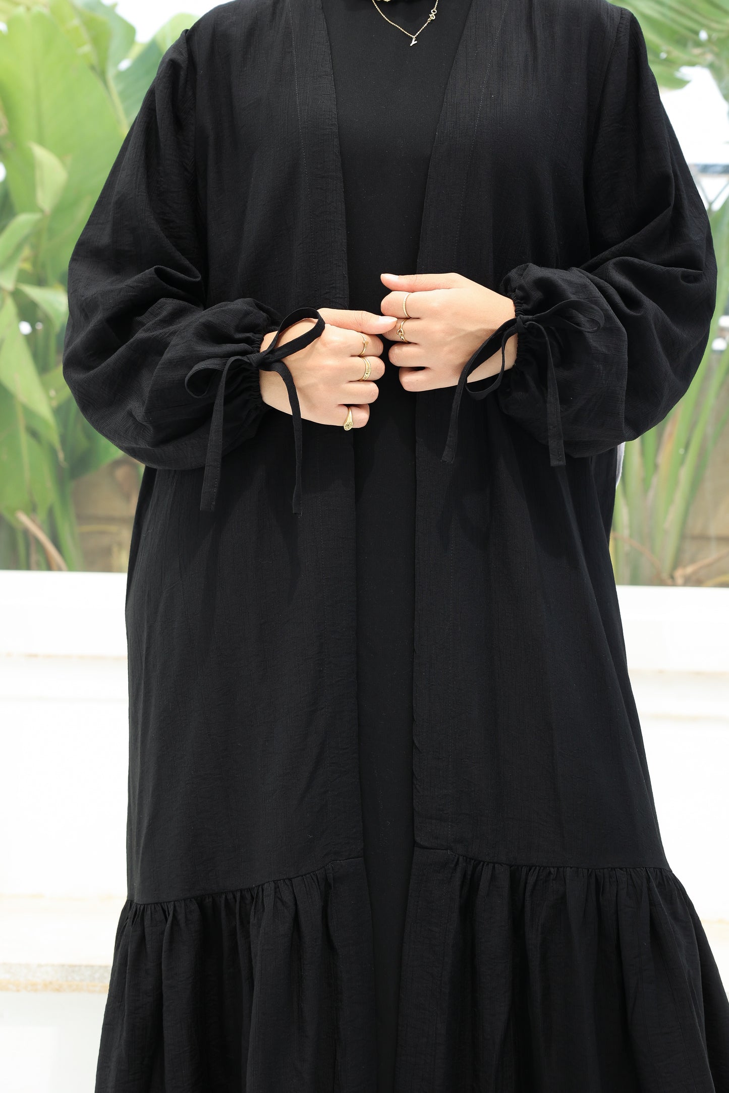 The Ruffled Cardigan in Black