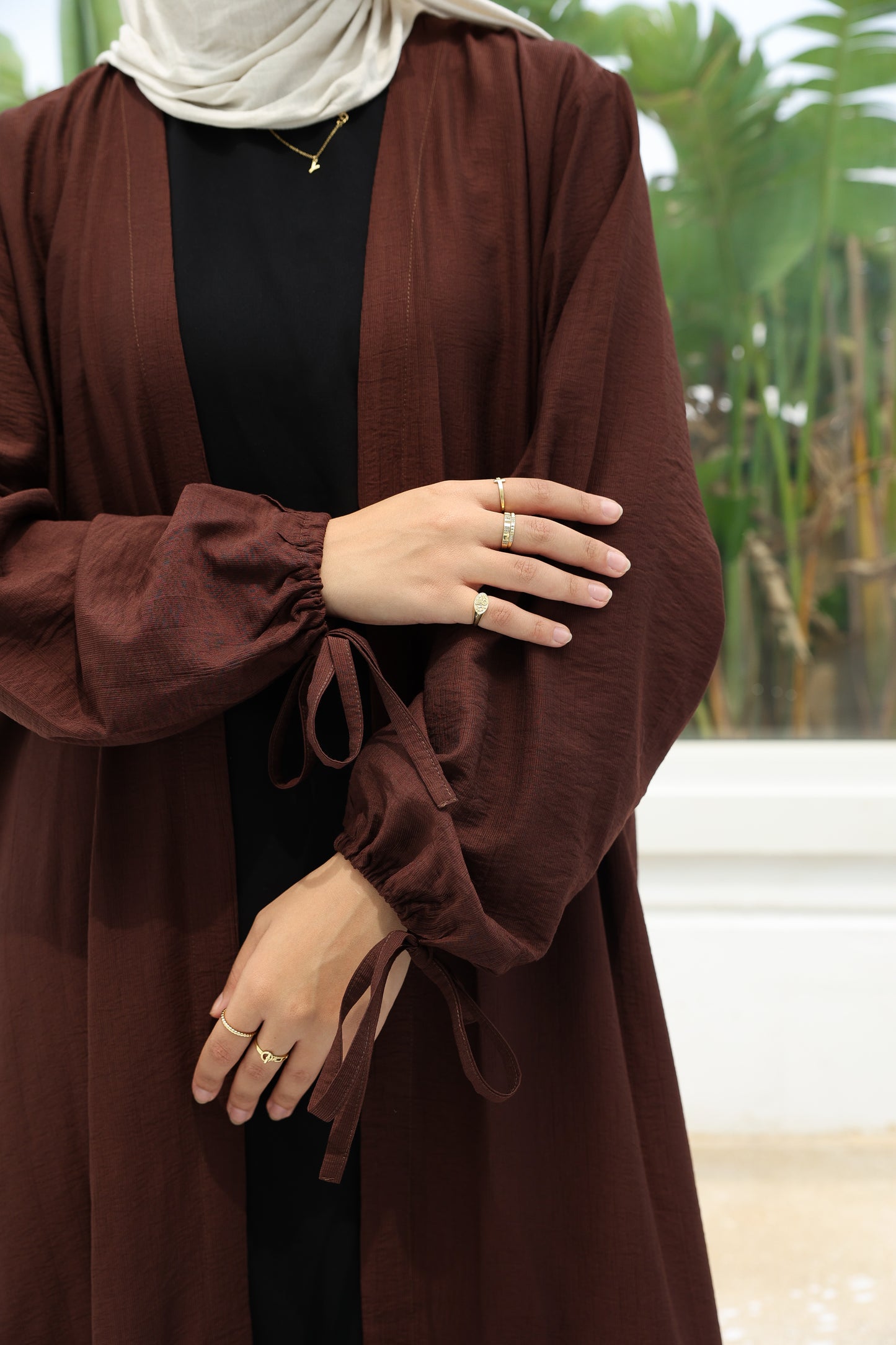 The Ruffled Cardigan in Brown